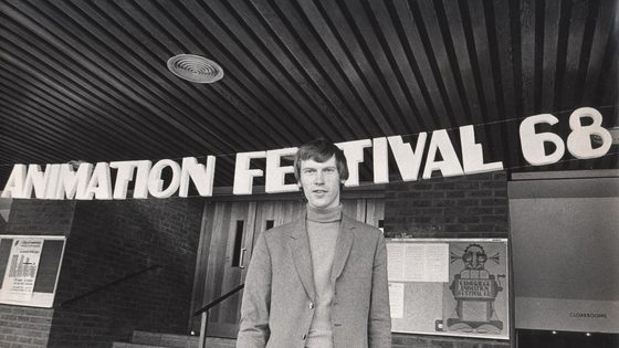 Dick Arnall beneath the lettering 'ANIMATION FESTIVAL 68' above the entrance steps