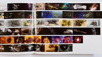 The animate! Book open at a spread of film stills in rows